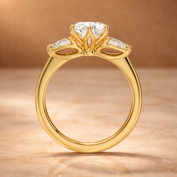 profile view of 3 diamonds ring pear shape