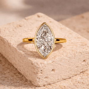 Bezel setting, 3 carat marque diamond engagement ring